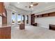 Inviting office space featuring custom built-in shelving, desk area, and balcony access at 73 Kittansett Loop, Henderson, NV 89052