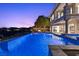 Luxury home showcasing a captivating blue swimming pool and outdoor space at 73 Kittansett Loop, Henderson, NV 89052