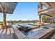 Luxury pool area features fountains and a covered patio with columns and scenic views at 73 Kittansett Loop, Henderson, NV 89052