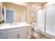 Clean bathroom with white vanity, shower, and modern fixtures at 7733 Harthill Park Ave, Las Vegas, NV 89113