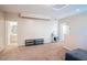 Neutral bonus room with carpet flooring, minimal decor, and a bathroom view offers versatility at 7733 Harthill Park Ave, Las Vegas, NV 89113