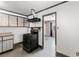 A view of the kitchen featuring uniquely styled cabinets and black oven at 805 E Carey Ave, North Las Vegas, NV 89030