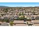 Community houses highlighting well-maintained roofs, landscaped yards, and solar panels at 8563 Red Diamond St, Las Vegas, NV 89123