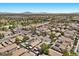 Wide angle of a neighborhood showcasing modern homes, community parks, and convenient street parking at 8563 Red Diamond St, Las Vegas, NV 89123