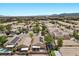 Residential community with homes featuring well-maintained yards, desert landscaping, solar panels, and in-ground pools at 8563 Red Diamond St, Las Vegas, NV 89123