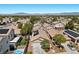 Well-maintained community featuring modern homes with pools, solar panels and landscaped yards in a desert landscape at 8563 Red Diamond St, Las Vegas, NV 89123