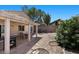 Charming backyard featuring a covered patio, perfect for outdoor relaxation at 8563 Red Diamond St, Las Vegas, NV 89123