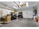 Spacious garage with shelving, ample storage, and a functional workspace at 8563 Red Diamond St, Las Vegas, NV 89123