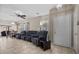 Open-concept living room featuring tile floors and a view to the backyard at 8563 Red Diamond St, Las Vegas, NV 89123