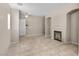 Spacious living room with tile floors and fireplace at 8563 Red Diamond St, Las Vegas, NV 89123
