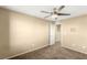 Bedroom with neutral walls, carpet, white trim, and a ceiling fan at 8930 W Ford Ave, Las Vegas, NV 89148