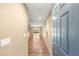 Inviting foyer with gleaming hardwood floors extending into the spacious living area at 8930 W Ford Ave, Las Vegas, NV 89148