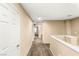 Upstairs hallway with carpeted floor and several doors at 8930 W Ford Ave, Las Vegas, NV 89148