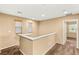 Upstairs hallway with natural light and carpet floors, leading to bedrooms at 8930 W Ford Ave, Las Vegas, NV 89148