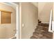 Carpeted staircase with neutral walls leading to the upper level of the home at 8930 W Ford Ave, Las Vegas, NV 89148