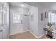Bright foyer featuring neutral walls, tile flooring, and a decorative glass front door at 905 Smith St, Las Vegas, NV 89108