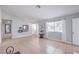 Bright living room featuring neutral walls, tile flooring and natural light at 905 Smith St, Las Vegas, NV 89108