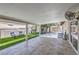 Covered patio with tile flooring offers a shaded space to enjoy the backyard at 905 Smith St, Las Vegas, NV 89108