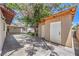 Backyard storage shed offers extra space for tools and equipment, located in a large, shaded yard at 905 Smith St, Las Vegas, NV 89108