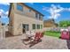 Spacious backyard featuring a patio, artificial turf, and seating area perfect for relaxing at 9131 Grand Sunburst Ct, Las Vegas, NV 89149