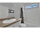 Clean bathroom featuring a shower-tub combination and granite vanity top at 9131 Grand Sunburst Ct, Las Vegas, NV 89149