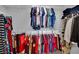 Walk-in closet with organized storage racks and hanging space at 9131 Grand Sunburst Ct, Las Vegas, NV 89149