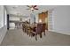 Open dining room area featuring barn door accent and access to the modern kitchen at 9131 Grand Sunburst Ct, Las Vegas, NV 89149