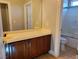 Bright bathroom featuring single vanity and a separate tub and shower at 9321 Lady Finger Ct, Las Vegas, NV 89149