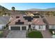 Charming single-Gathering home features a tile roof, two-car garage, and lush green lawn at 9612 Glengarry Dr, Las Vegas, NV 89129