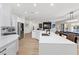 Bright kitchen with stainless steel appliances, modern fixtures, and seamless flow into the adjacent living spaces at 9612 Glengarry Dr, Las Vegas, NV 89129