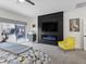 This main bedroom offers a modern fireplace, backyard access and ample natural light from the backyard at 9612 Glengarry Dr, Las Vegas, NV 89129
