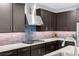 Close-up of the modern kitchen with quartz countertops and stainless steel appliances at 9785 Granite Mesa St, Las Vegas, NV 89141