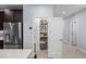 A walk-in pantry with ample shelving space and easy access to the kitchen appliances at 9785 Granite Mesa St, Las Vegas, NV 89141