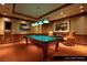 Billiard room with a classic pool table, comfortable seating, and soft lighting at 1 Hughes Center Dr # 903, Las Vegas, NV 89169