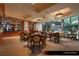 Well appointed card room featuring tables, seating, refreshments and tranquil views at 1 Hughes Center Dr # 903, Las Vegas, NV 89169