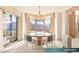 Bright dining area with large windows, modern lighting, and city views at 1 Hughes Center Dr # 903, Las Vegas, NV 89169