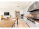 This kitchen features granite countertops, modern stainless steel appliances, and custom white cabinets at 1 Hughes Center Dr # 903, Las Vegas, NV 89169