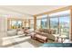 Elegant dining and Gathering room combo with city views and natural light at 1 Hughes Center Dr # 903, Las Vegas, NV 89169