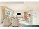 Comfortable Gathering room and kitchen offering an open layout with city views at 1 Hughes Center Dr # 903, Las Vegas, NV 89169