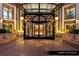 Ornate lobby entrance showcasing a decorative iron gate and meticulous landscaping at 1 Hughes Center Dr # 903, Las Vegas, NV 89169