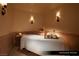 Comfortable massage room featuring a massage table, candles and decor at 1 Hughes Center Dr # 903, Las Vegas, NV 89169