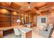 Office with decorative, dark wood accents at 1 Hughes Center Dr # 903, Las Vegas, NV 89169