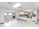 Bright and open living space with skylights flowing into modern kitchen at 1050 Morgan Ln, Pahrump, NV 89060