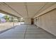 Spacious covered patio, perfect for outdoor entertaining, with an exterior door at 1050 Morgan Ln, Pahrump, NV 89060
