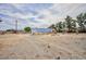 Vast solar panel array alongside a play structure at 1050 Morgan Ln, Pahrump, NV 89060