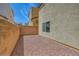 Low maintenance backyard featuring gravel and brick perimeter wall at 10725 Wrigley Field Ave, Las Vegas, NV 89166