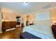 Bedroom with neutral walls and trim shows access to kitchen and dining at 10725 Wrigley Field Ave, Las Vegas, NV 89166