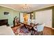 Spacious dining room with modern decor, stylish seating, and bright lighting at 10725 Wrigley Field Ave, Las Vegas, NV 89166