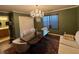 Inviting dining area with a chandelier, rug, and ample seating at 10725 Wrigley Field Ave, Las Vegas, NV 89166
