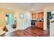 Open entryway features wood floors, a convenient bar area, and easy access to other rooms at 10725 Wrigley Field Ave, Las Vegas, NV 89166